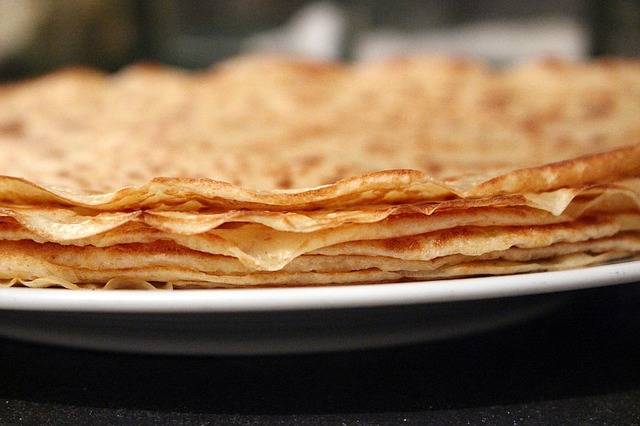 Groot pannenkoekenfeest in Der Aa-kerk tijdens Sint Pannekoek