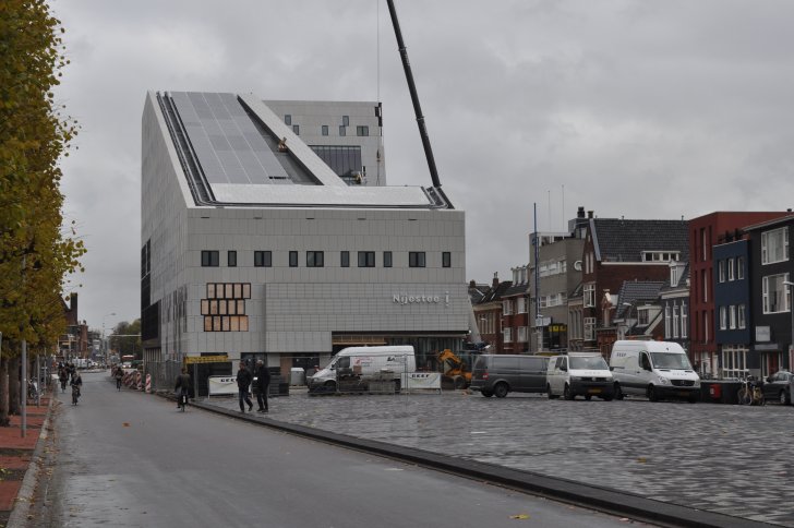 Nieuwbouw van Nijestee en parkeergarage aan het Damsterdiep