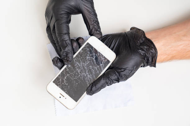 Technician or engineer preparing to repair and replace new screen broken and cracked screen smartphone preparing on desk