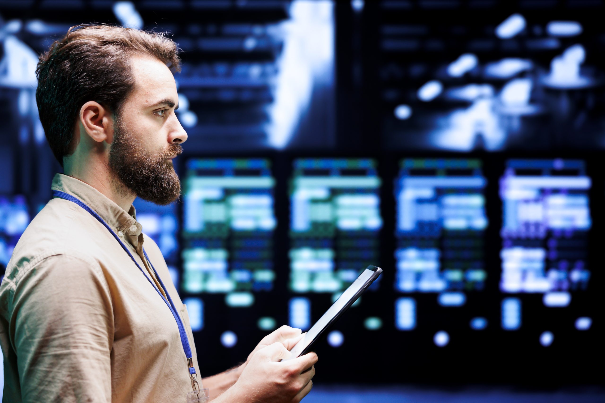 IT developer setting up high tech data center firewalls, intrusion detection systems and doing security updates. Cybersecurity employee preventing hacking, malware, and DDoS attacks in server hub