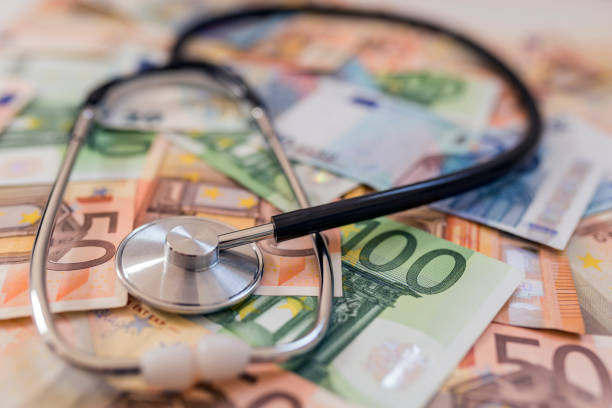 Black Stethoscope  on euro banknote money,  background  illustrating expensive healthcare - medical concept. Costs for the medical insurance.