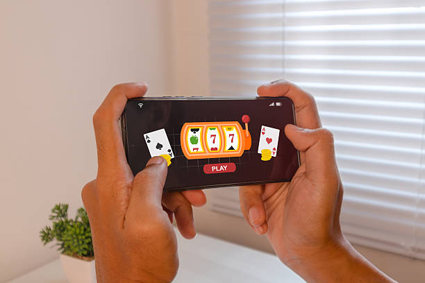 Man playing online casino gambling on a mobile phone